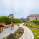 Landscaped garden at Polmanter Touring Park's self-catering holiday cottage St Ives