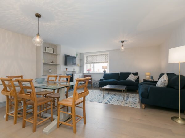 Open plan dining and living room area in Polmanter Touring Park's self-catering holiday cottage St Ives