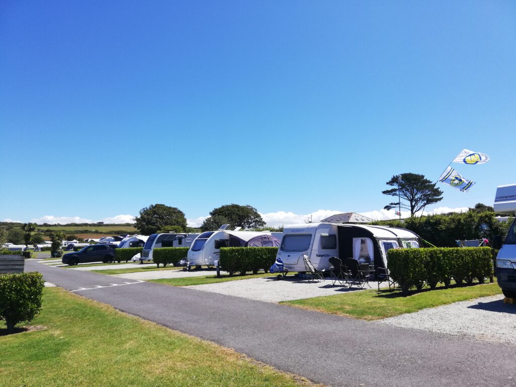 Caravans pitched up on spacious plots at Polmanter Touring Park in St Ives