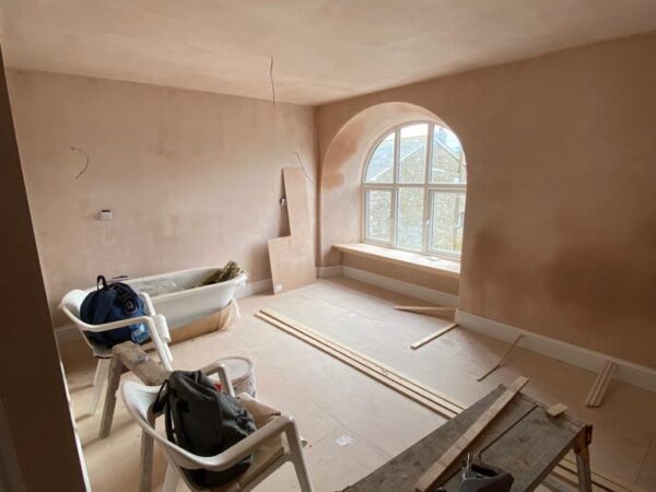 Polmanter holiday cottage renovation in the first bedroom with plastered walls