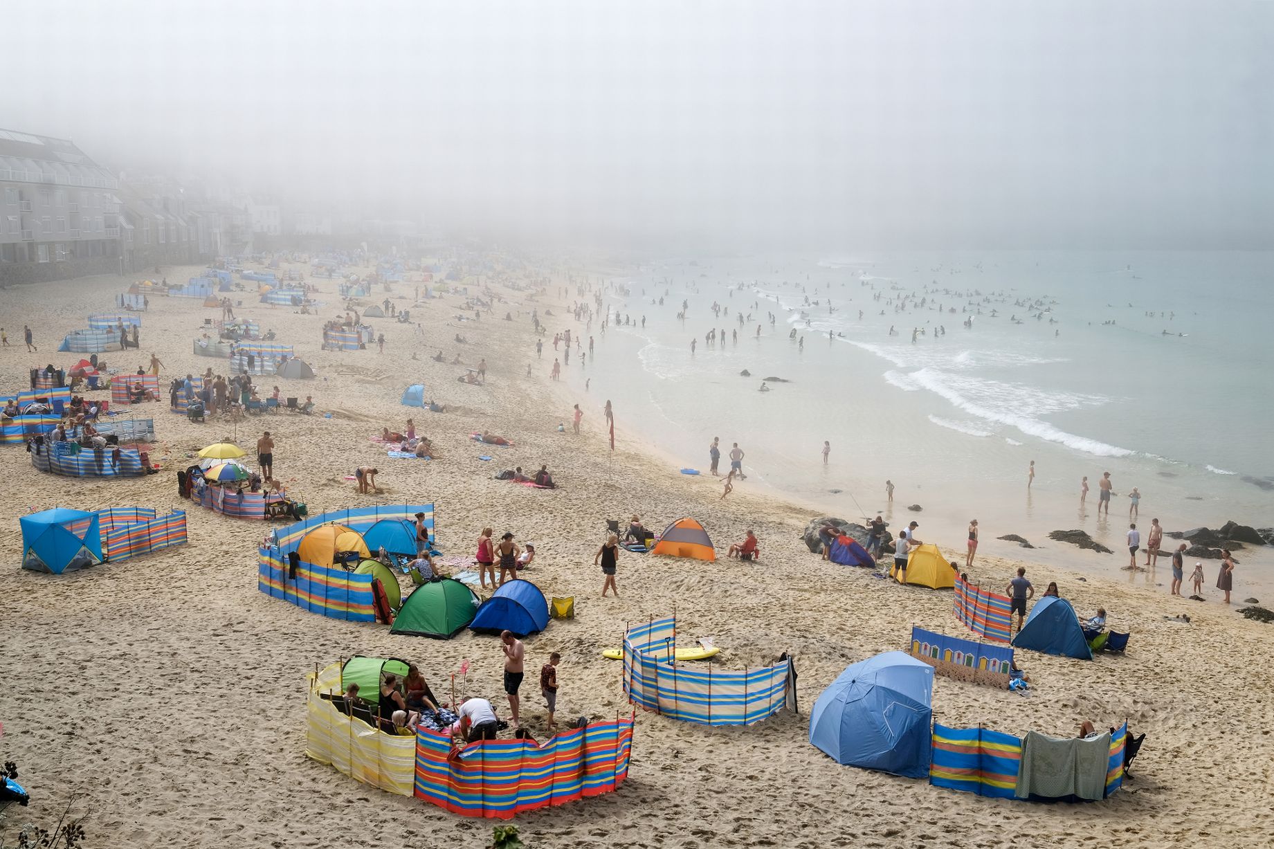 Mist over Porthmeor Beach on a foggy day in Cornwall