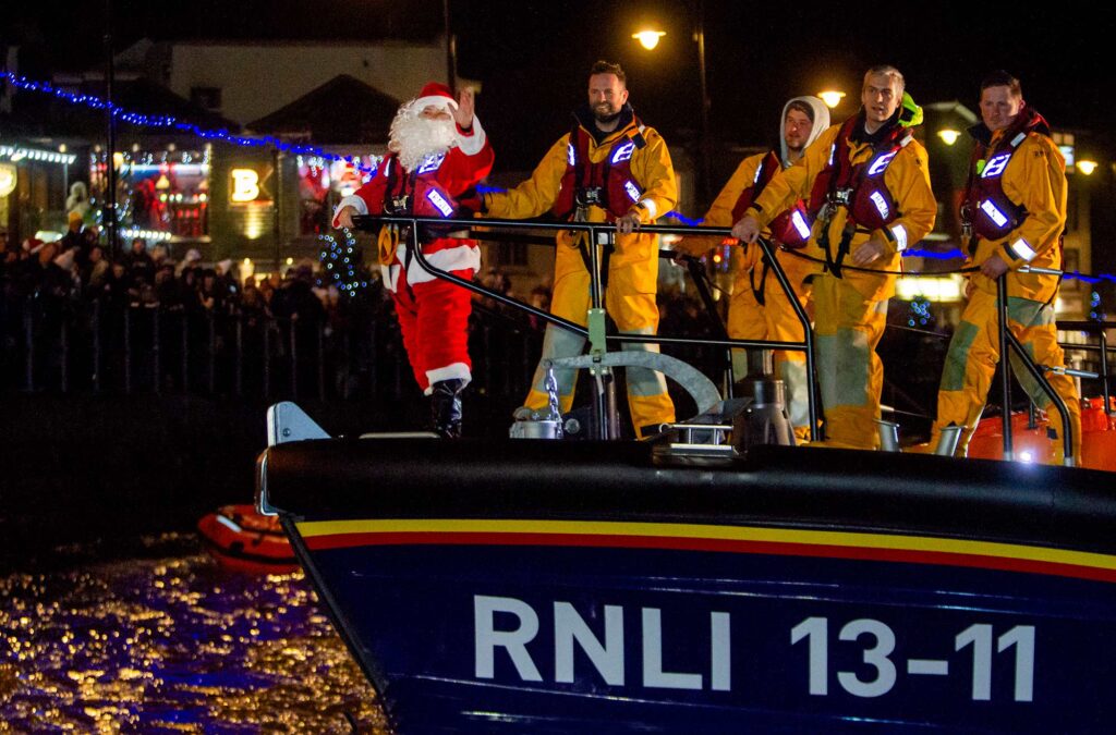 Santa on RNLI lifeboat in St Ives harbour