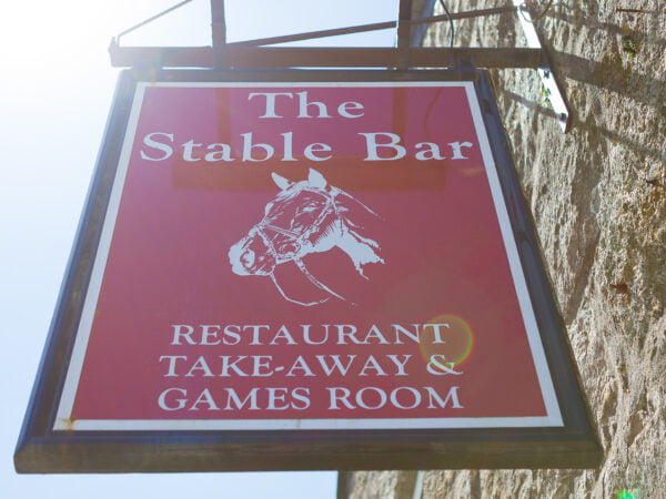 The Stable Bar sign hanging at Polmanter Touring Park