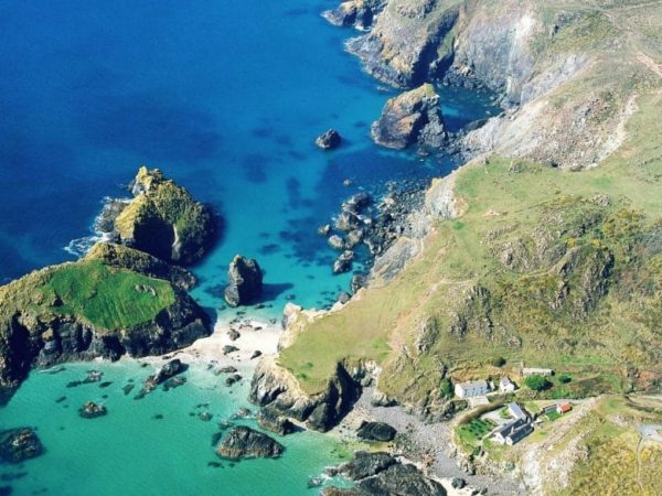 Looking down on the turquoise waters of Kynance Cove from the cliff top